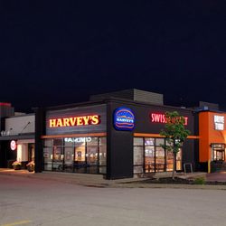 Harvey's - Storefront at night