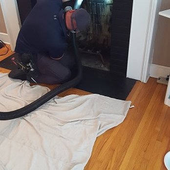 Chimney Sweep Experts - Justin cleaning from the bottom - Chimney Sweeps Near Me - Kernersville, North Carolina Chimney Sweep Experts - Justin cleaning from the bottom - Chimney Sweeps Near Me - Kernersville, North Carolina