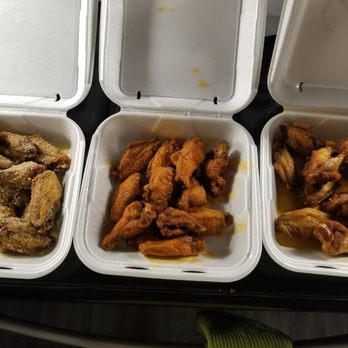 Wing Slingers - Garlic parm, garlic hot, and golden. All were great but Garlic hot is the best seller for a reason. - Chicken Wings Near Me - Denver, Colorado
