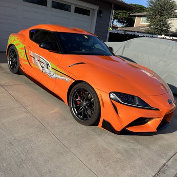 Proven Auto - GR Supra wrapped in orange gold + Fast and furious tribute graphic install - Auto Detailing Near Me Proven Auto - GR Supra wrapped in orange gold + Fast and furious tribute graphic install - Auto Detailing Near Me