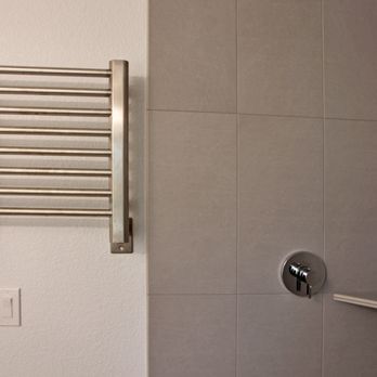 AA Quality Construction - We always try to find affordable ways to bring touches of luxury with little things, such as this towel warmer. - General Contractors Near Me