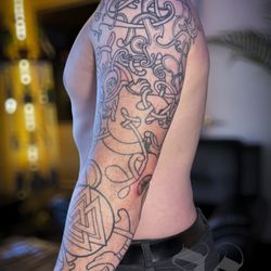 Aloha Tattoos - Norse Osenberg style Viking sleeve tattoo by Jon Poulson at Aloha Tattoos in Murray, UT