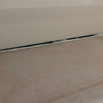 Mr Handy Dandy Restorations - This is how the bottom of the new bathtub was left. Nightmare. - Handyman Near Me - Casselberry, Florida
