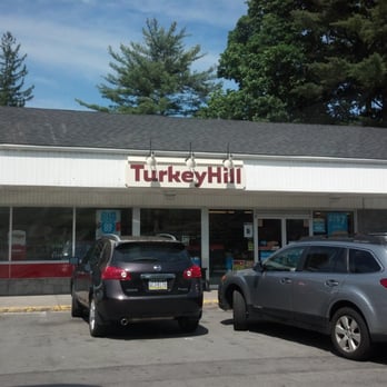 Turkey Hill - two cars parked in front of a store - Grocery Near Me - Milford, Pennsylvania