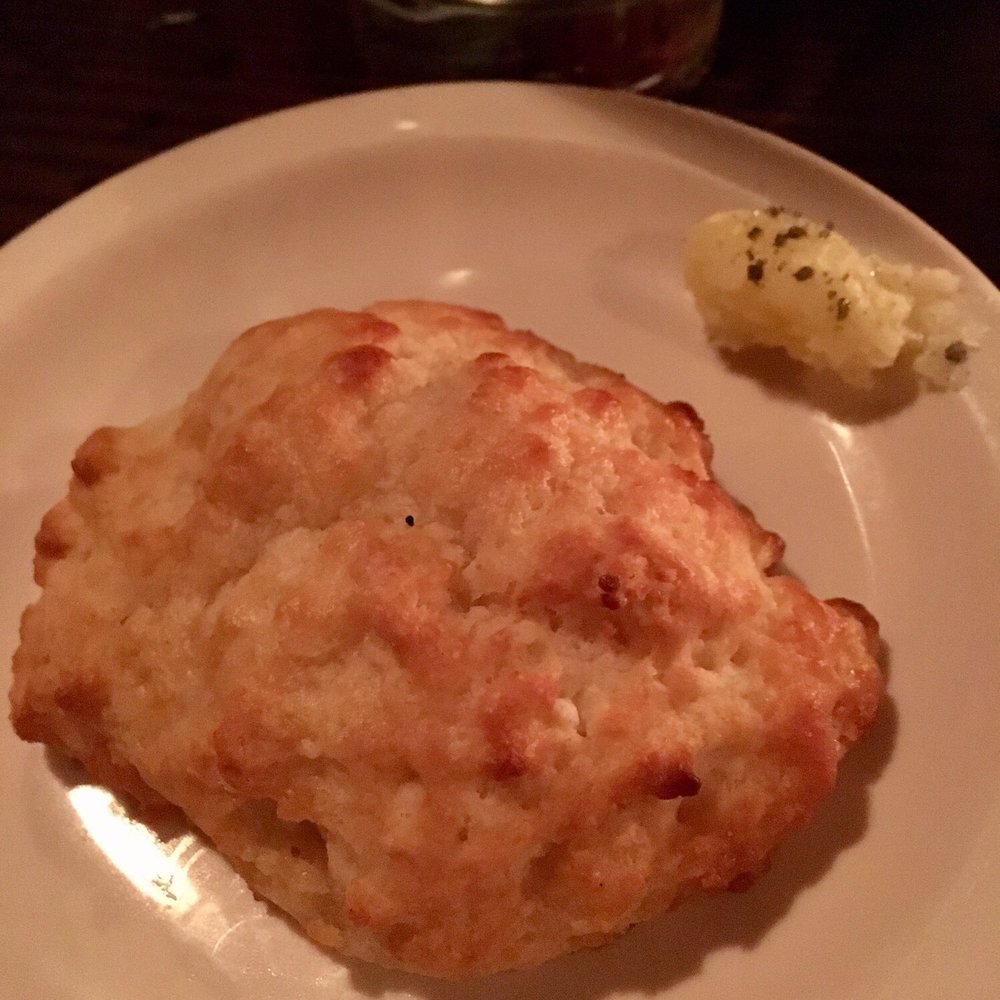 Bogie's Place - Cheddar biscuit with salted honey butter - Bars Near Me - Boston, Massachusetts Bogie's Place - Cheddar biscuit with salted honey butter - Bars Near Me - Boston, Massachusetts