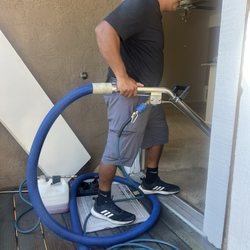 Rodriguez Janitorial Maintenance - Tony working hard to clean carpets