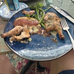 Poussin (Small chicken with smashed Yukon gold potatoes and broccoli rabe. Poussin (Small chicken with smashed Yukon gold potatoes and broccoli rabe.