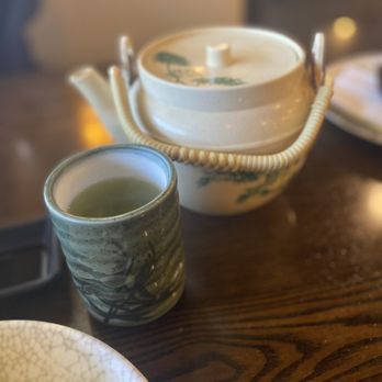 Izumi Japanese Buffet - a plate of food and a cup of tea - Japanese Near Me - Evans, Georgia