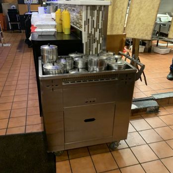 Yummy House - a kitchen with pots and pans on the stove - Dim Sum Near Me - Ocala, Florida Yummy House - a kitchen with pots and pans on the stove - Dim Sum Near Me - Ocala, Florida