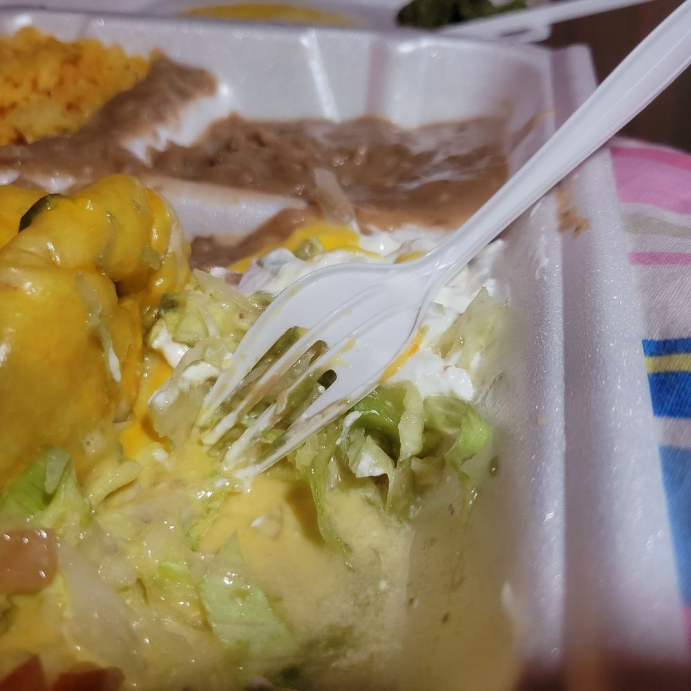 La Casita - Close up of water in the same compartment as the Chimichanga. - Mexican Near Me - Pflugerville, Texas La Casita - Close up of water in the same compartment as the Chimichanga. - Mexican Near Me - Pflugerville, Texas