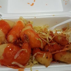 Oriental Wok - Sweet and sour prawn and ginger chicken on top of fried noodles