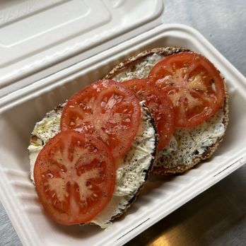 Apollo Bagels - sesame bagel with scallion cream cheese and tomato - Bagels Near Me - New York, New York