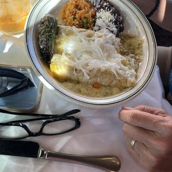 Flora - 2 Green Enchiladas a la Caymus Delicious big and fat  My husband ate the whole thing !  But the jalapeño was $1.00 extra ‍ - Mexican Near Me - Houston, Texas