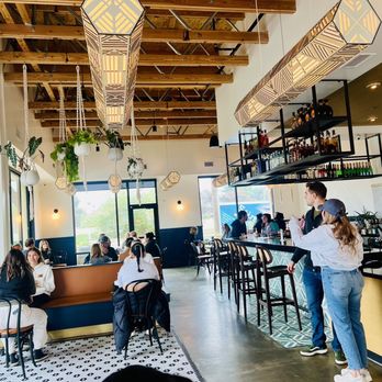 Cafe Smitten - a group of people sitting at a bar - Breakfast & Brunch Near Me - Bakersfield, California