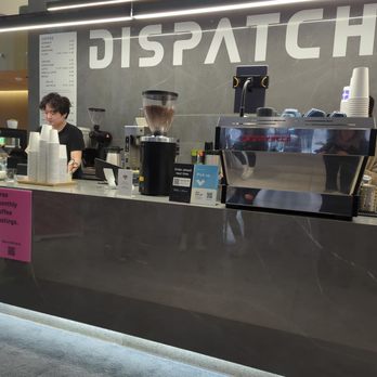 Dispatch - a woman behind a counter at a coffee shop - Coffee & Tea Near Me - Toronto, Ontario
