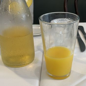 Tujague's Restaurant - Bottomless mimosas- our group mixed their own to their liking. - Cajun/Creole Near Me - New Orleans, Louisiana