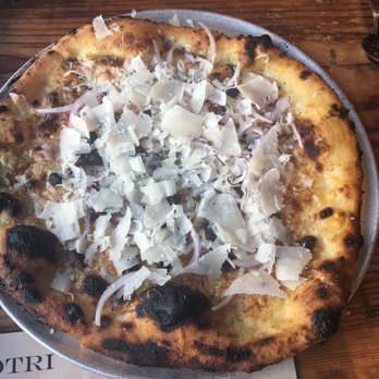 Oenotri - Intenso pizza with roasted pistachios & shaved red onion - Italian Near Me - Napa, California Oenotri - Intenso pizza with roasted pistachios & shaved red onion - Italian Near Me - Napa, California