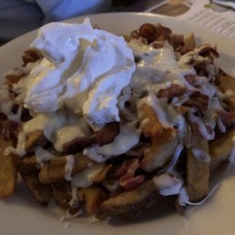 Fries with cheese, bacon & sour cream