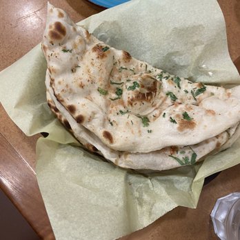 Raavi - Garlic Naan Bread - Indian Near Me - San Francisco, California