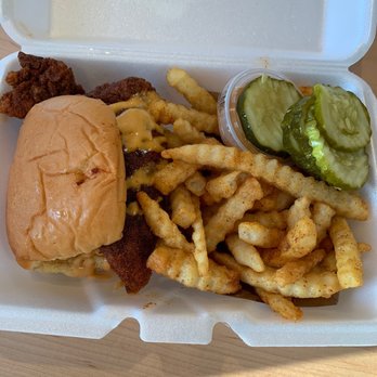 Dave's Hot Chicken - Medium heat chicken sandwich and fries - Chicken Shop Near Me - Altamonte Springs, Florida Dave's Hot Chicken - Medium heat chicken sandwich and fries - Chicken Shop Near Me - Altamonte Springs, Florida