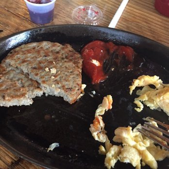 Two Cracked Eggs Cafe - Sausage and eggs - half eaten - Breakfast & Brunch Near Me - Savannah, Georgia