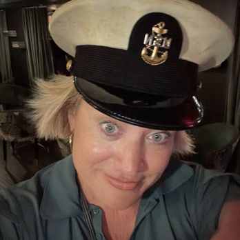 The Armory Speakeasy - There is a rack of all different kinds of hats. - Burgers Near Me - Key Largo, Florida The Armory Speakeasy - There is a rack of all different kinds of hats. - Burgers Near Me - Key Largo, Florida