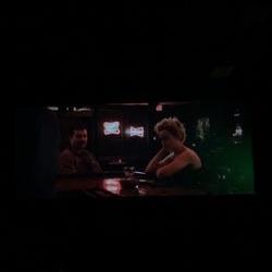 Hot Springs Mall Cinema - Picture of screen in focus. Dark, blurry, grainy. This isn't edited to make it look different. This is exactly how it appeared in person.