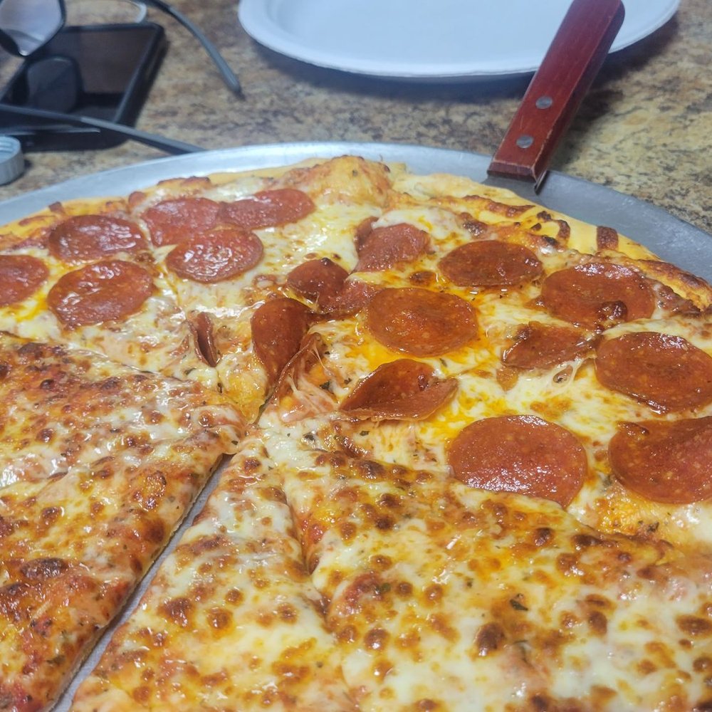 Bulldogs Pizza - Half Cheese Half Pepperoni - Pizza Near Me - Spring, Texas Bulldogs Pizza - Half Cheese Half Pepperoni - Pizza Near Me - Spring, Texas
