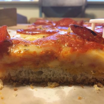 Marco Polo Pizzerias - a slice of pizza - Pizza Near Me - Ronkonkoma, New York