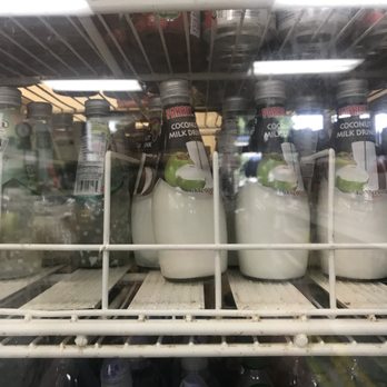 La Quemada - a shelf of milk in a refrigerator - International Grocery Near Me - Redmond, Washington La Quemada - a shelf of milk in a refrigerator - International Grocery Near Me - Redmond, Washington