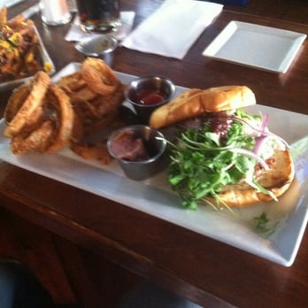 The Fork n Cork - Duck duck goose burger with onion rings - New American Near Me - Wilmington, North Carolina