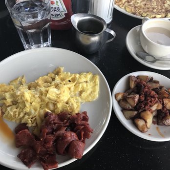 Sergio's Restaurant - 2 Eggs with Swiss Cheese. Chorizo. Potatoes. - Cuban Near Me - Miami, Florida Sergio's Restaurant - 2 Eggs with Swiss Cheese. Chorizo. Potatoes. - Cuban Near Me - Miami, Florida
