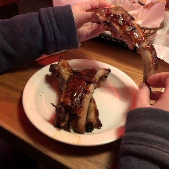 Logan's Roadhouse - Rib and fries appetizer. 3/4 of a half rack - American Near Me - Greenville, South Carolina