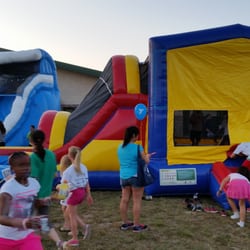 Austin Metro Moonwalks - Tsunami Water slide and Covered Combo Bounce House at the Gator Glow Event at Gattis Elementary