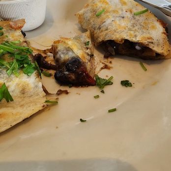 Floret - Generous amounts of everything, plus a side of sour cream and house made salsa.  Delish! - Vegetarian Near Me - Seattle, Washington