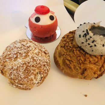 Bibble & Sip - From left to right: earl grey cream puff, Lychee Berry, and Black Sesame Walnut Cream Puff - Coffee & Tea Near Me - New York, New York Bibble & Sip - From left to right: earl grey cream puff, Lychee Berry, and Black Sesame Walnut Cream Puff - Coffee & Tea Near Me - New York, New York