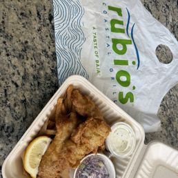 Fish & Chips (2 pc) And I added an additional piece for $2. It included Crispy fries and Purple cabbage slaw, tartar sauce and lemon wedge Fish & Chips (2 pc) And I added an additional piece for $2. It included Crispy fries and Purple cabbage slaw, tartar sauce and lemon wedge