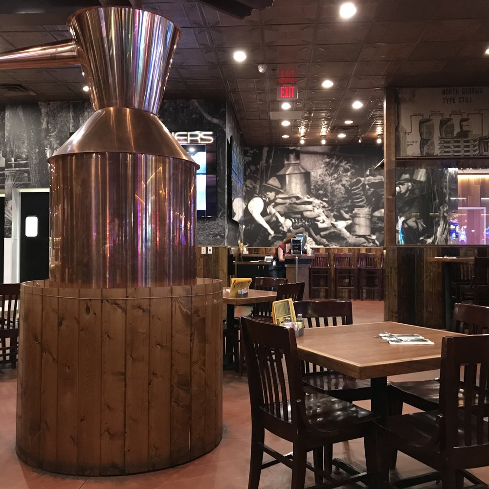 Moonshiners - Moonshine still decoration - American Near Me - Pahrump, Nevada