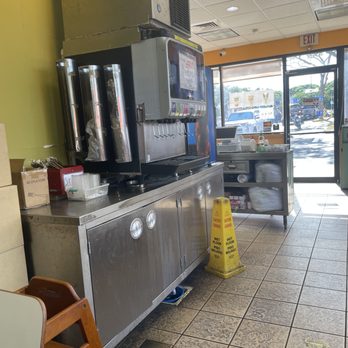 Loco Moco Drive Inn - This shows the soda/water dispenser with the ice cream pictures in the front of the store. - Fast Food Near Me - Waipahu, Hawaii Loco Moco Drive Inn - This shows the soda/water dispenser with the ice cream pictures in the front of the store. - Fast Food Near Me - Waipahu, Hawaii