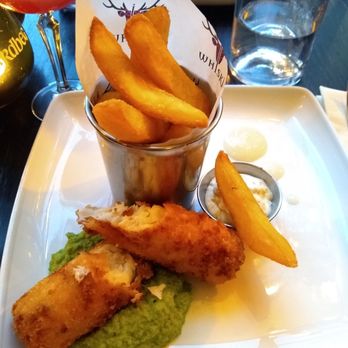 WHISKI Rooms - VERY tasty fish and chips with mushy peas. The chips are crisp, fish very flavorful with a zesty tartar sauce. Yummy mushy peas, too. - British Near Me - Edinburgh, EDH WHISKI Rooms - VERY tasty fish and chips with mushy peas. The chips are crisp, fish very flavorful with a zesty tartar sauce. Yummy mushy peas, too. - British Near Me - Edinburgh, EDH