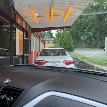 Indi's Fast Food Restaurant - a car parked in front of the restaurant - Chicken Wings Near Me - Lexington, Kentucky Indi's Fast Food Restaurant - a car parked in front of the restaurant - Chicken Wings Near Me - Lexington, Kentucky