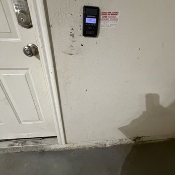 On Q Property Management - Dirty garage wall with holes. - Property Management Near Me - Plano, Texas On Q Property Management - Dirty garage wall with holes. - Property Management Near Me - Plano, Texas