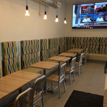 Aunty's Kitchen - a long table with chairs - Indian Near Me - Waterloo, Ontario