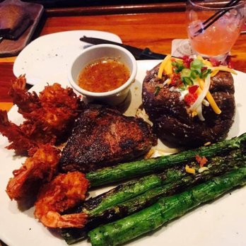 Outback Steakhouse - Surf and turf with baked potato and yummy grilled asparagus!!! - Steakhouses Near Me - Covina, California