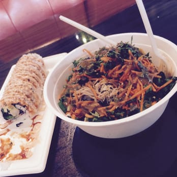 Dharma Sushi - Thai peanut lap bowl & a partially eaten sushi roll. - Sushi Bars Near Me - Boise, Idaho Dharma Sushi - Thai peanut lap bowl & a partially eaten sushi roll. - Sushi Bars Near Me - Boise, Idaho