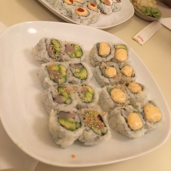 Goleta Sushi House - Left: yellowtail roll; right: spicy scallop roll. - Sushi Bars Near Me - Goleta, California Goleta Sushi House - Left: yellowtail roll; right: spicy scallop roll. - Sushi Bars Near Me - Goleta, California