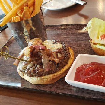 Aurora At The Celeste - Wagu burger grilled to a perfect medium with fries done crispy per request - American Near Me - Orlando, Florida