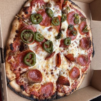 campfire pizza - Wood stove pizza. Served hot and fresh - Pizza Near Me campfire pizza - Wood stove pizza. Served hot and fresh - Pizza Near Me