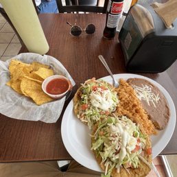 Complimentary chips and salsa with a $11 lunch special of chorizo tostadas with beans and rice. Complimentary chips and salsa with a $11 lunch special of chorizo tostadas with beans and rice.