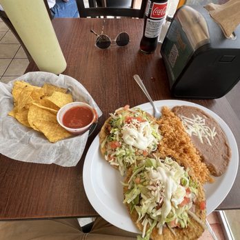 Arturo's Tacos - Complimentary chips and salsa with a $11 lunch special of chorizo tostadas with beans and rice. - Tacos Near Me - Grand Haven, Michigan Arturo's Tacos - Complimentary chips and salsa with a $11 lunch special of chorizo tostadas with beans and rice. - Tacos Near Me - Grand Haven, Michigan
